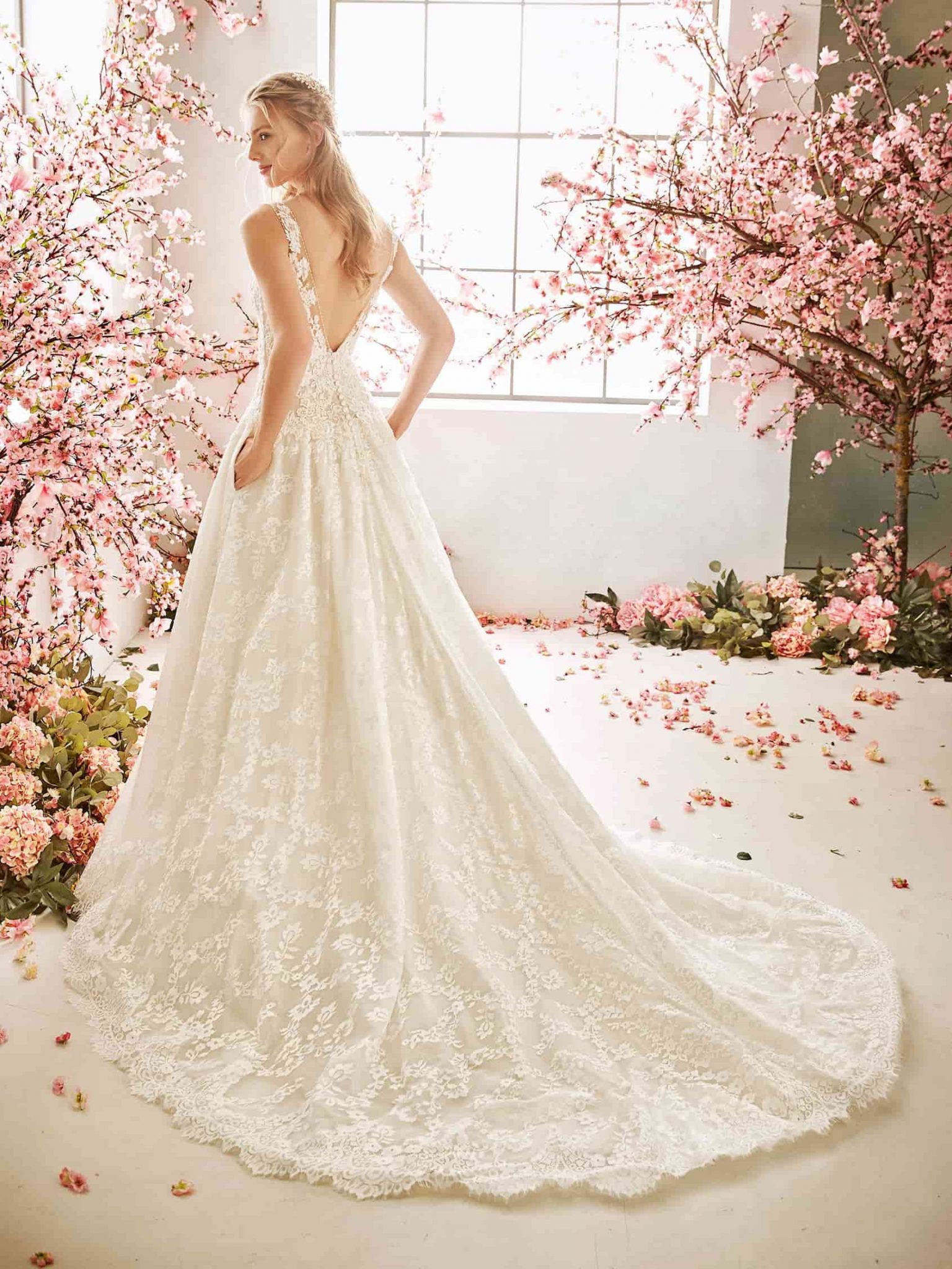 Stunning fully laced A-line wedding gown, deep V neck Modes Bridal NZ